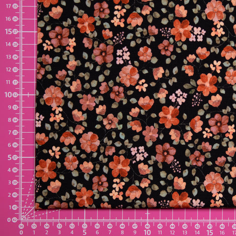 Jersey bawełniany GOTS pomarańczowe kwiaty na czerni