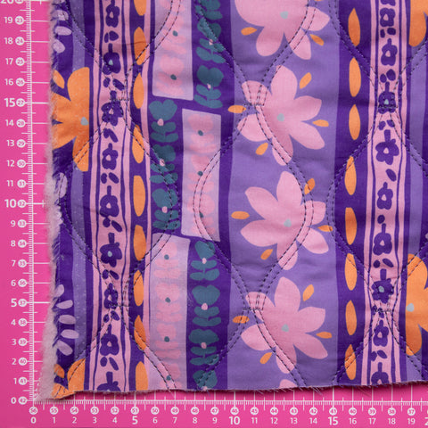 Tkanina pikowana dwustronna kwiaty pomarańcz i odcienie fioletu