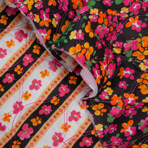 Tkanina pikowana dwustronna kwiaty na czerni