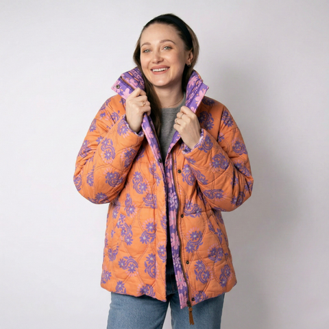 Tkanina pikowana dwustronna kwiaty pomarańcz i odcienie fioletu