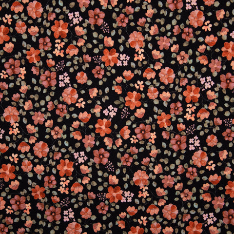 Jersey bawełniany GOTS pomarańczowe kwiaty na czerni