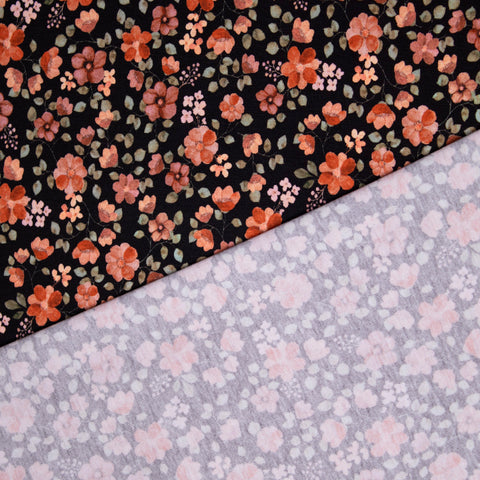 Jersey bawełniany GOTS pomarańczowe kwiaty na czerni