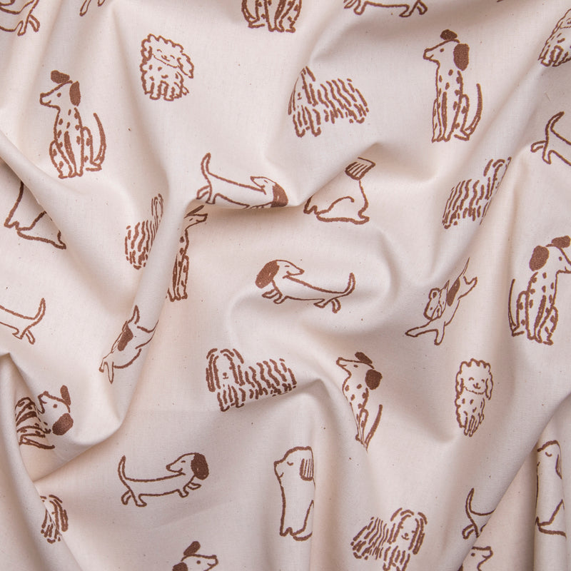 Popelina brązowe pieski na beżowym GOTS